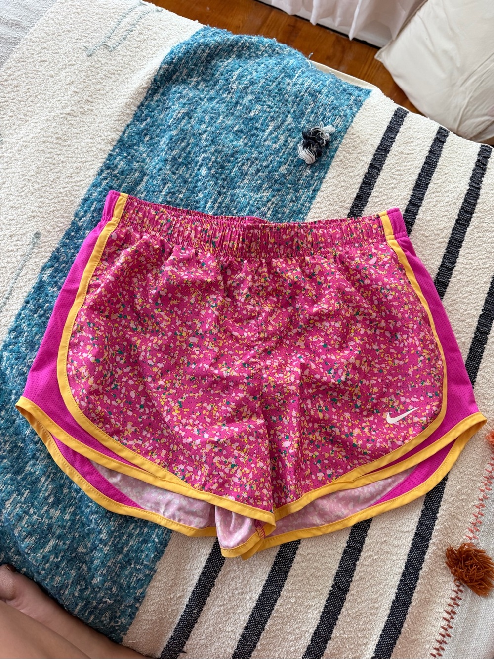 Nike Women's Pink Speckled Athletic Shorts with Yellow Trim